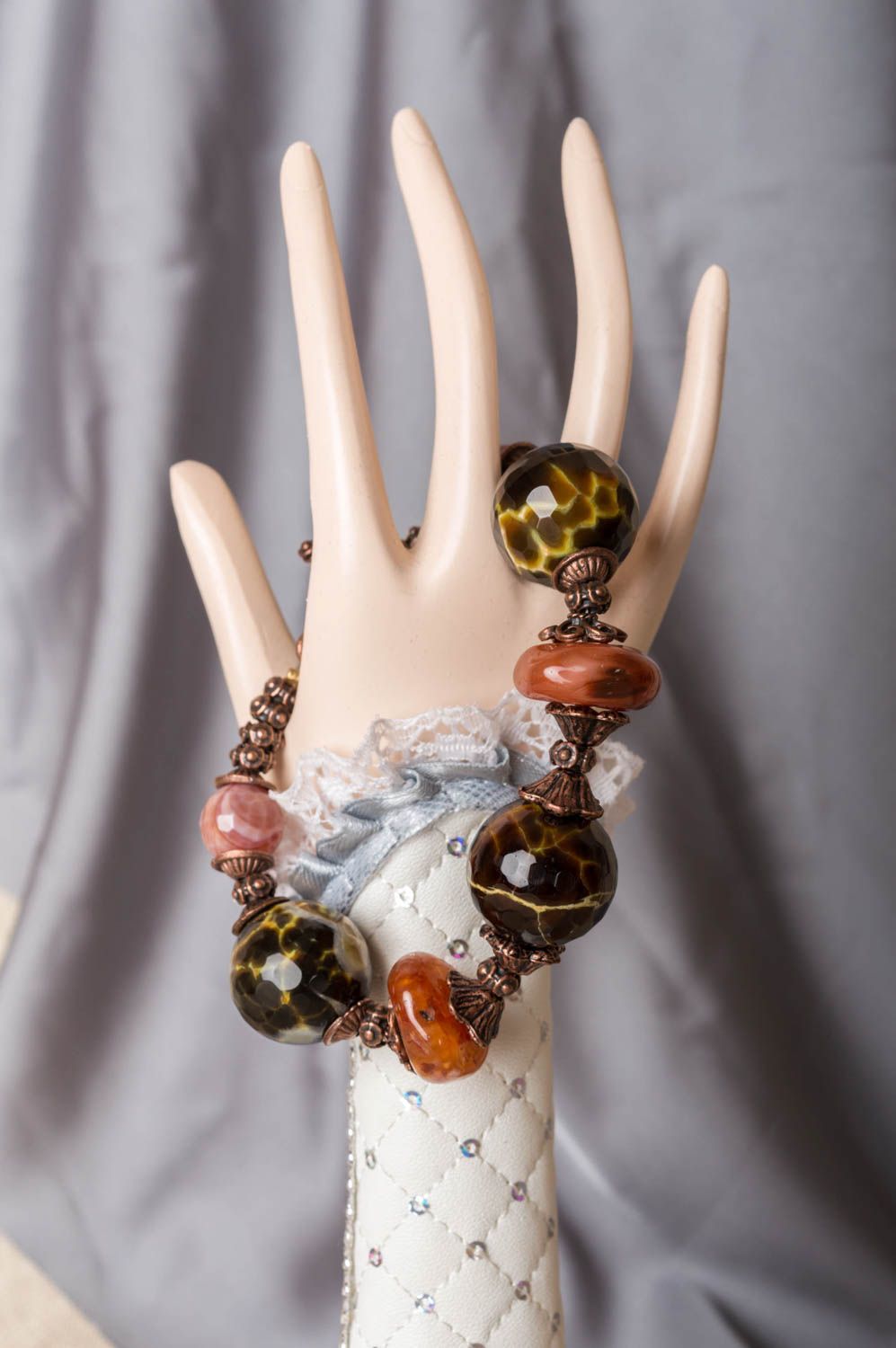 Handmade natural stone beaded wrist bracelet with latten elements for women photo 1
