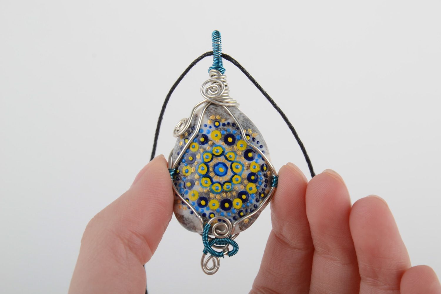 Unusual handmade pendant with painting on stone equipped with cord photo 4