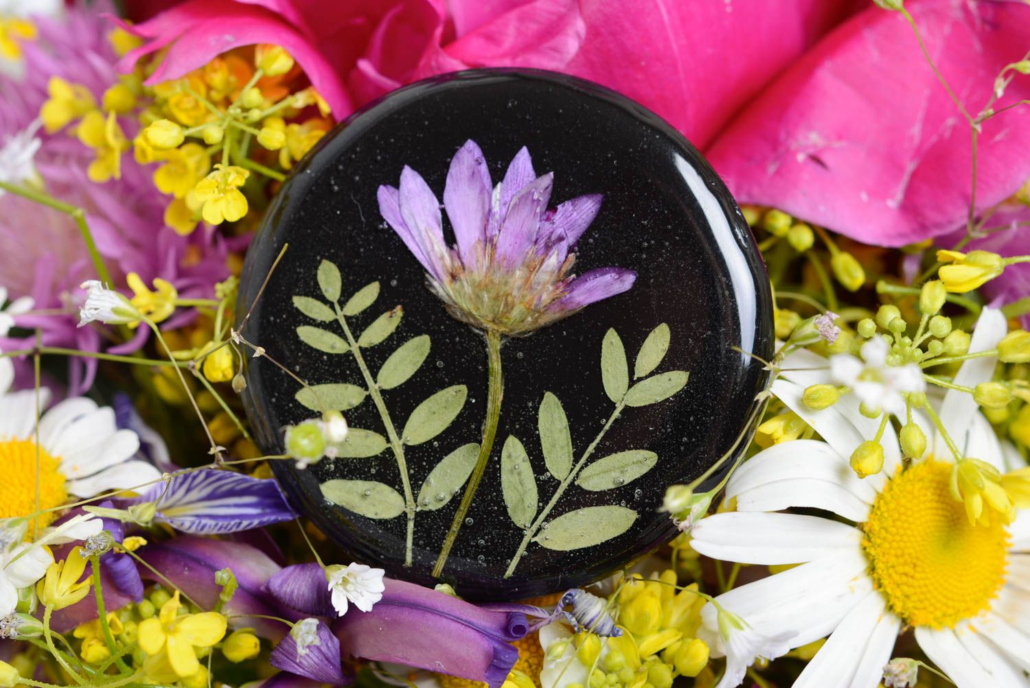 Black brooch with a flower in the epoxy resin handmade designer round accessory photo 1