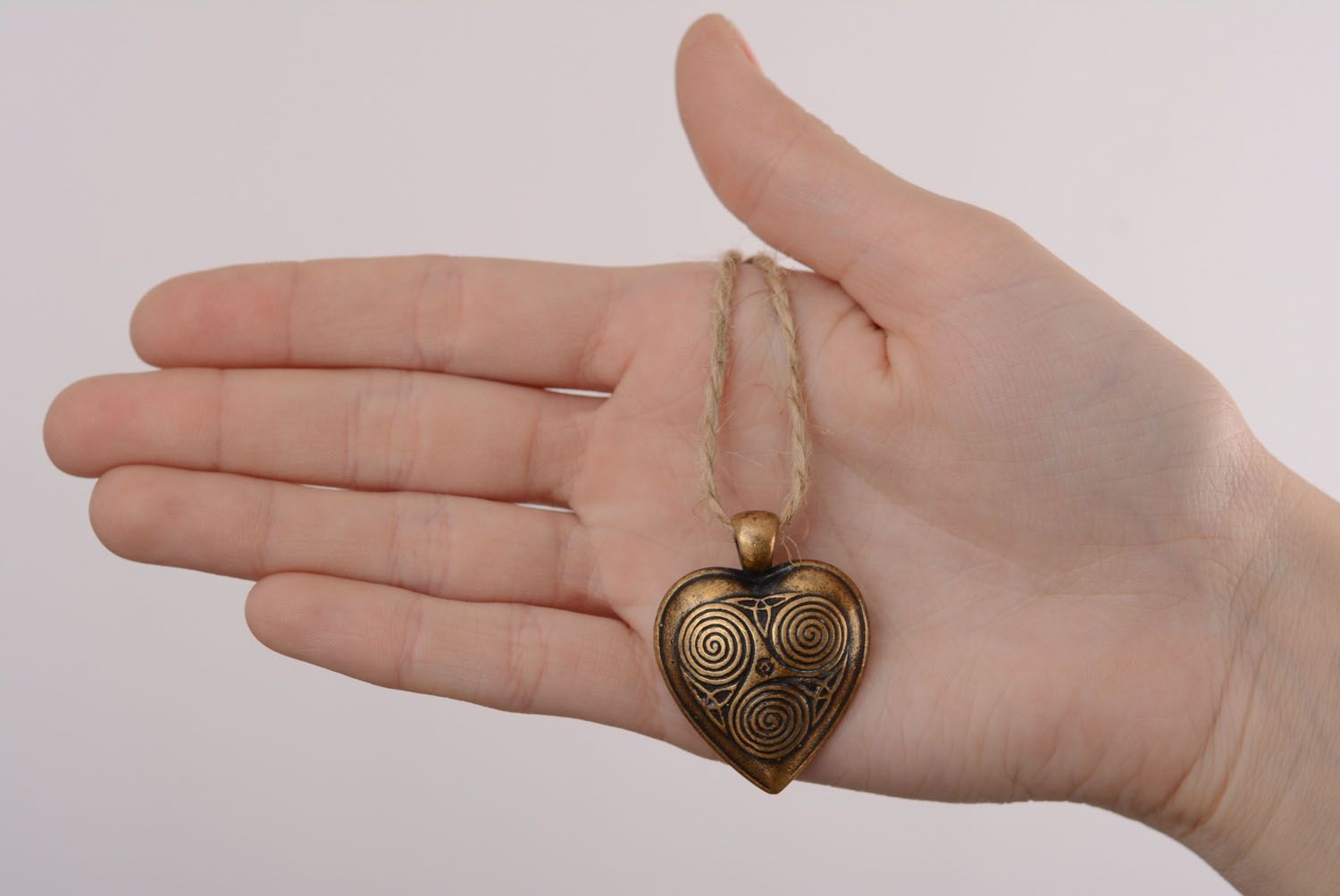 Heart-shaped bronze pendant photo 5