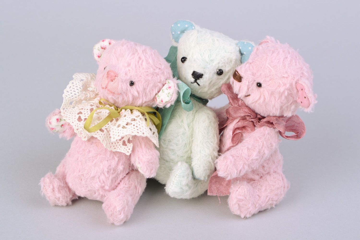 Set of handmade designer soft toy bears sewn of fabric of blue and pink colors  photo 1