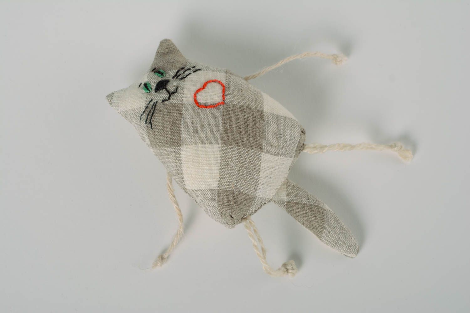 Handmade small soft toy cat sewn of checkered linen fabric with embroidered heart photo 3
