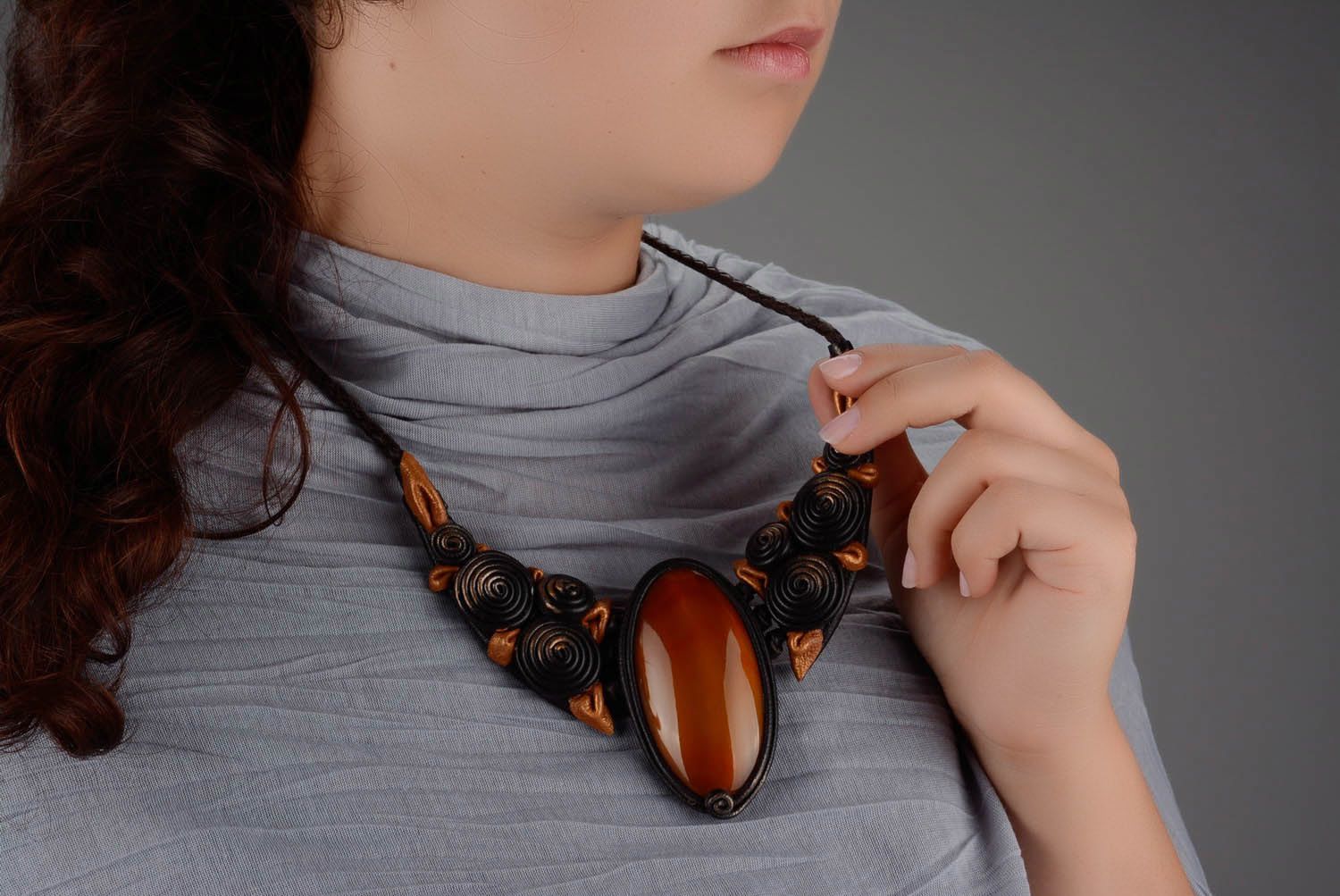 Necklace made ​​of leather and cow horn photo 4