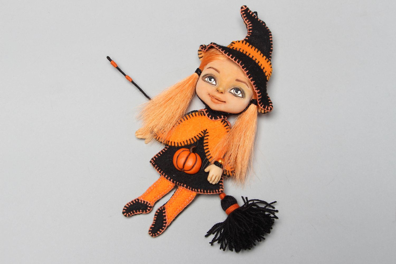 Textile felt brooch in the shape of doll witch photo 1