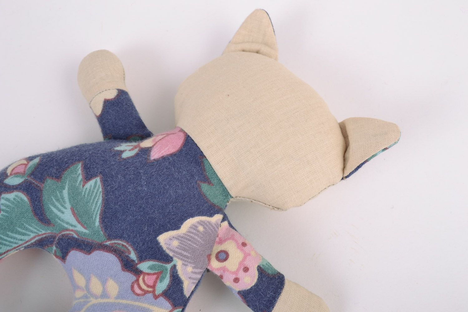 Handmade soft toy sewn of cotton fabric with floral pattern in the shape of cat photo 3