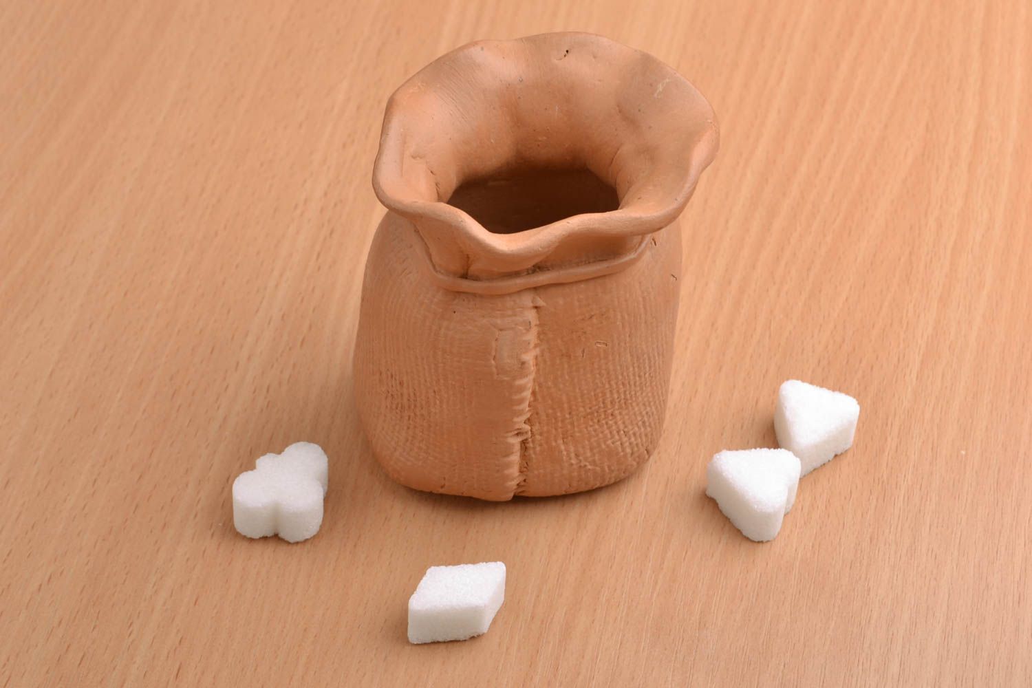 Zuckerdose aus Ton in Form vom Sack foto 1