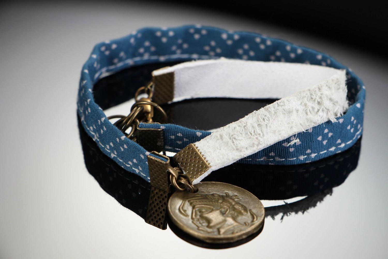 Double wrap bracelet made of leather and fabric photo 1