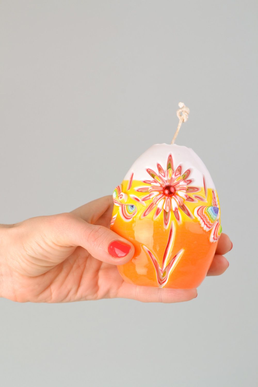 Vela artesanal de parafina con forma de huevo foto 2