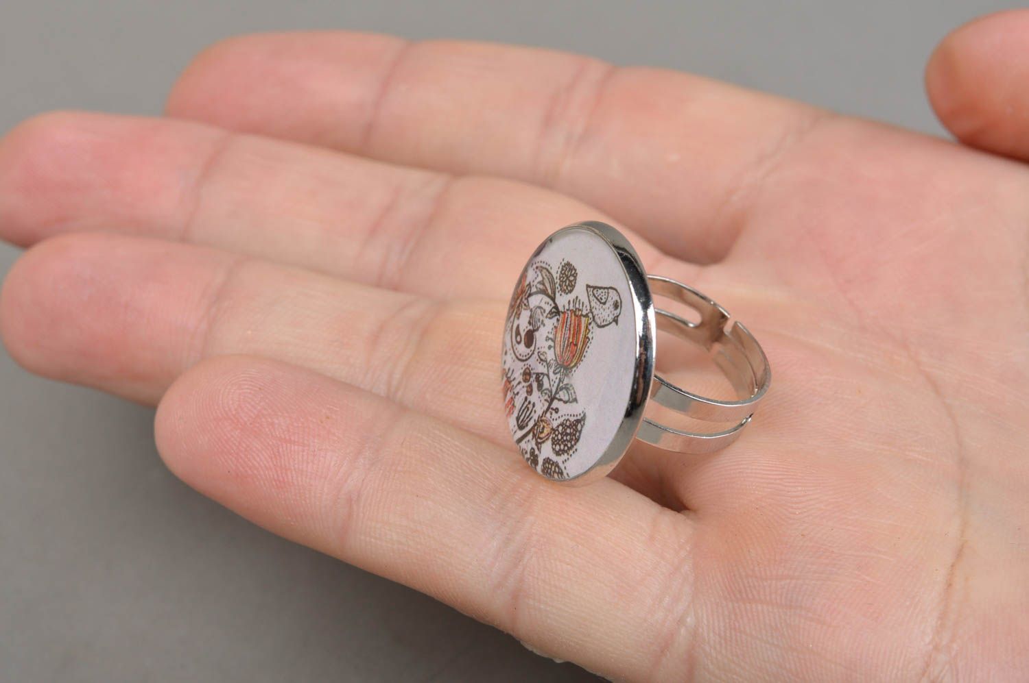Handmade round decoupage jewelry ring with jewelry resin and metal basis photo 3