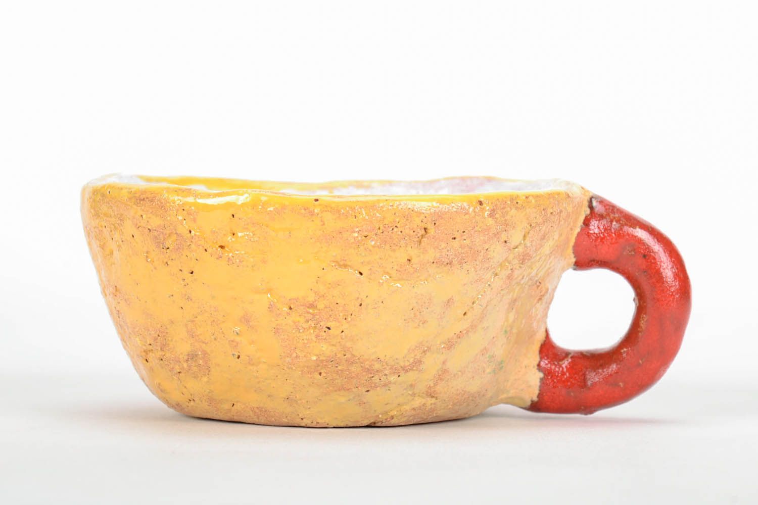 Hand-molded clay glazed cup in yellow and red colors. Wide cup with white inside glaze. photo 2
