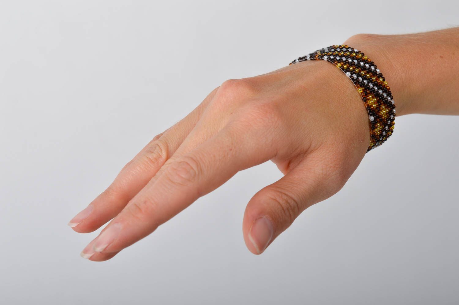 Handmade black, brown, yellow beaded bracelet adjustable for women photo 2