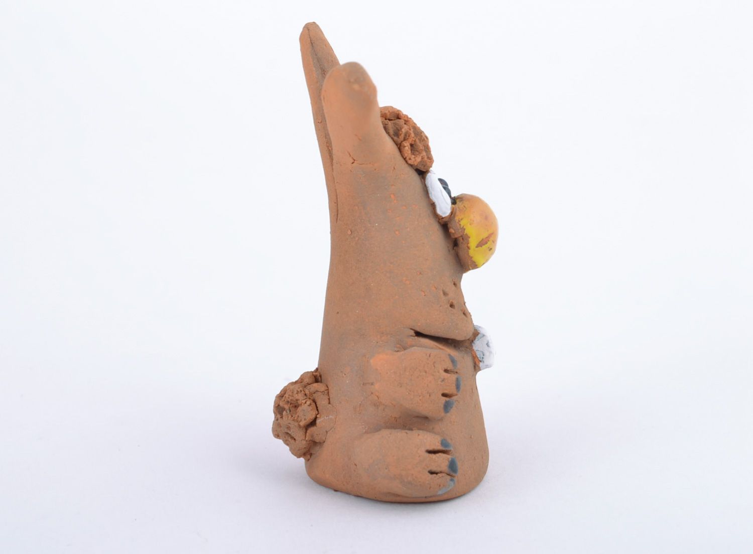 Small funny handmade ceramic figurine of rabbit coated with glaze for present photo 4
