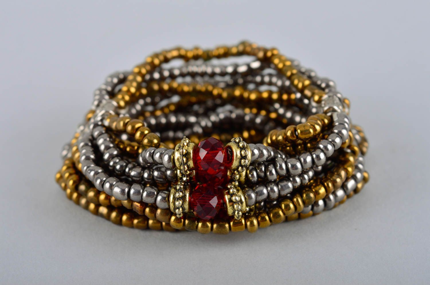 Multi-row wrist line bracelet made of silver and gold color beads for women photo 2