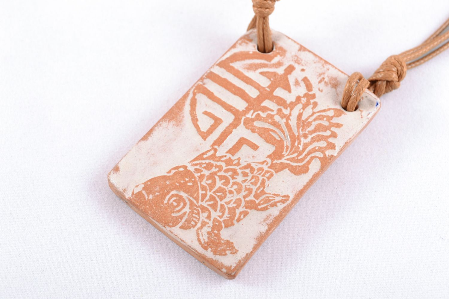 Handmade rectangular ceramic pendant with embossing photo 3