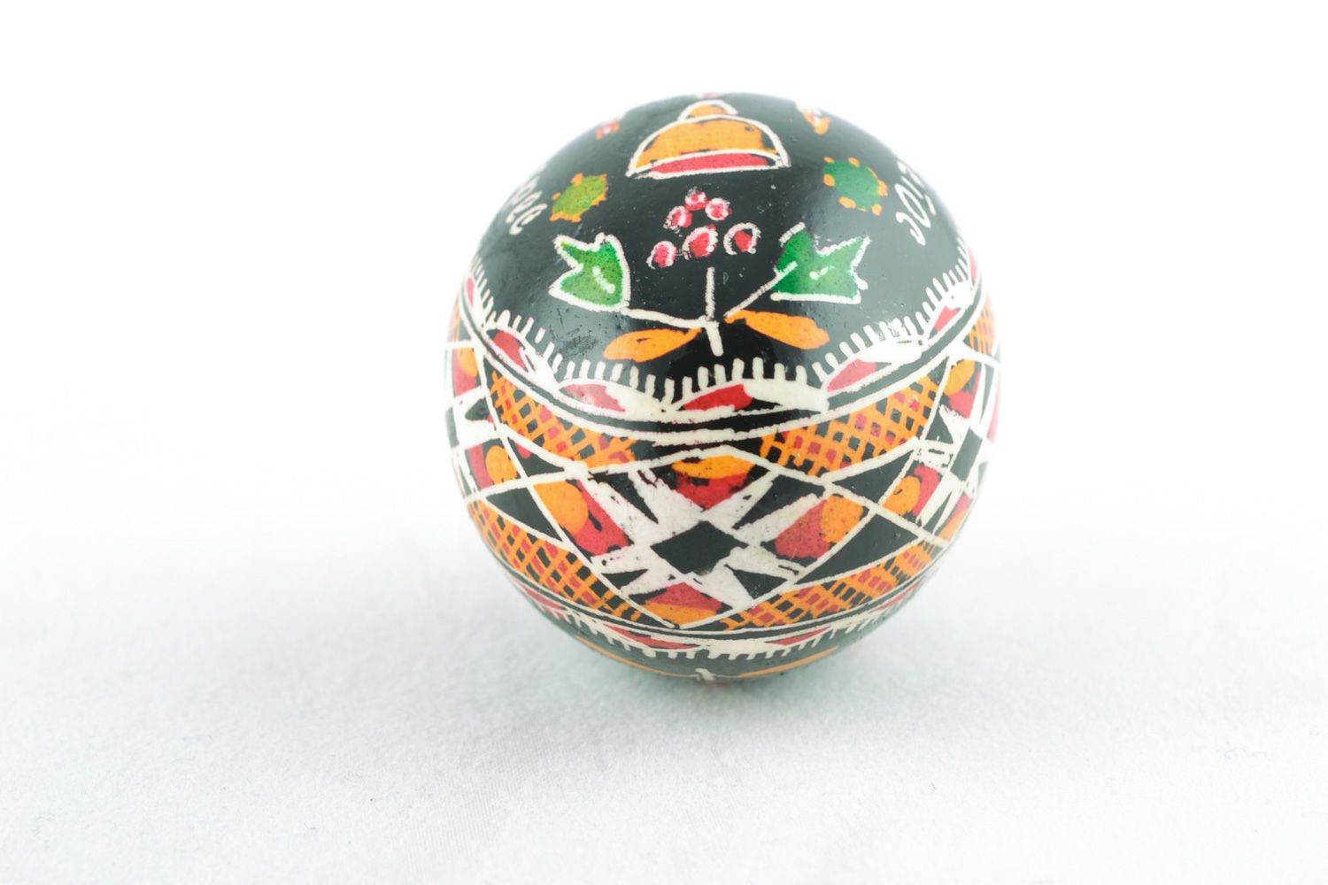 Handmade Easter egg painted using waxing technique photo 4