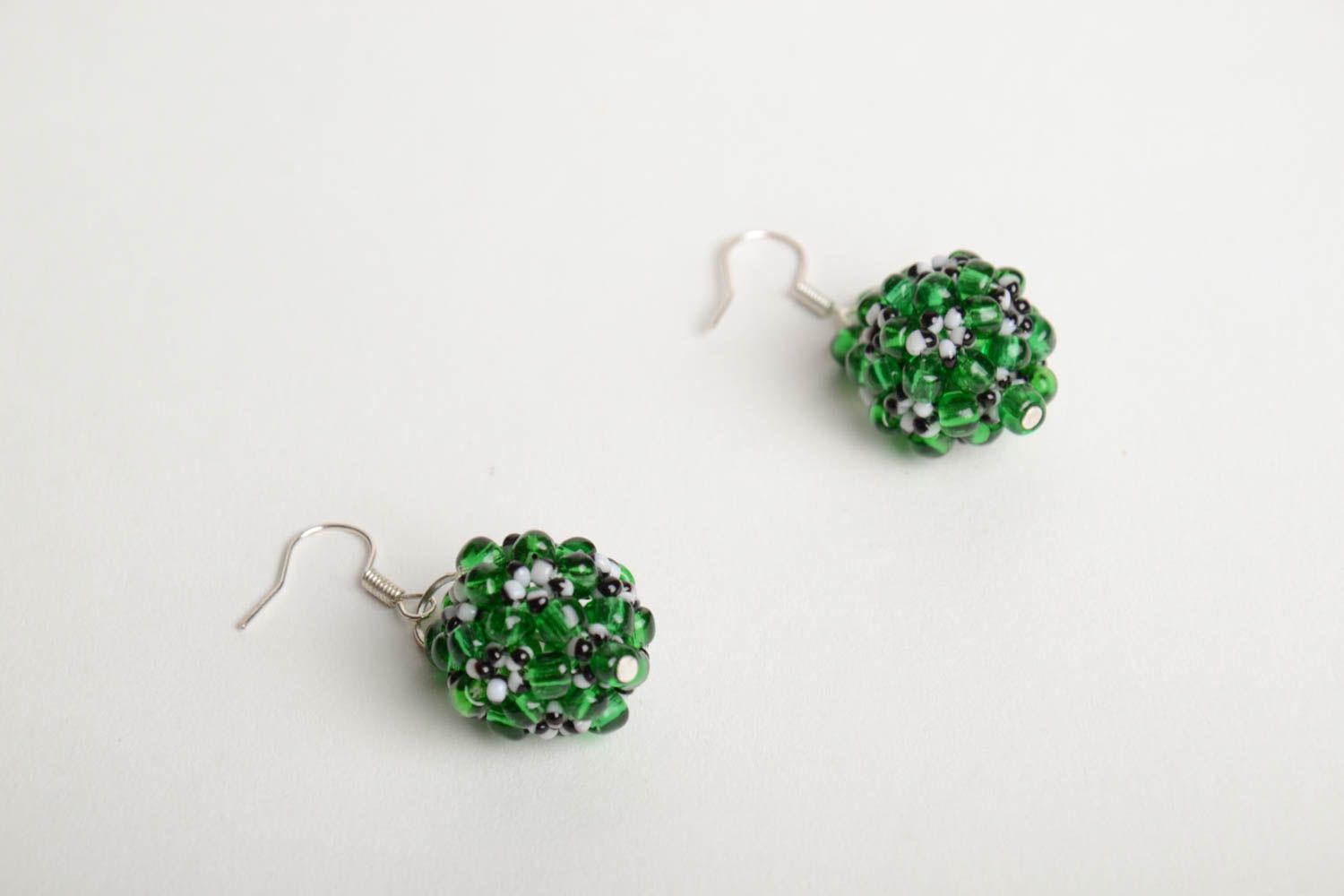 Handmade beautiful ball-shaped dangling earrings crocheted of green beads photo 4