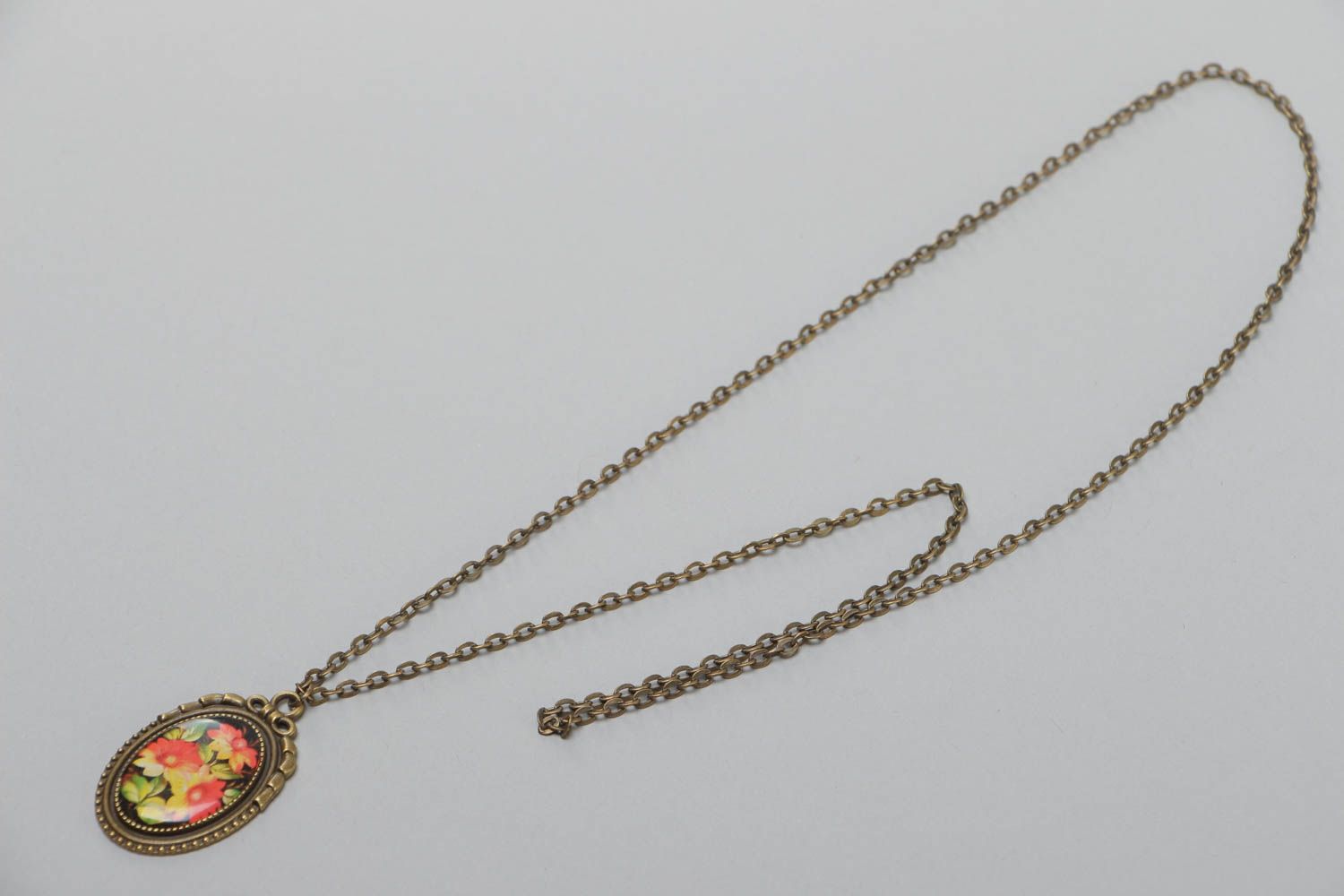 Handmade oval pendant with glass glaze and metal basis on long chain Flowers photo 2