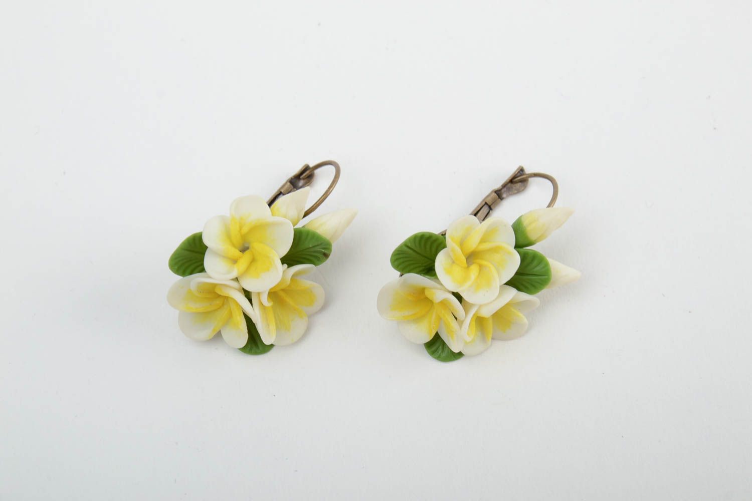 Handmade small neat earrings with cold porcelain yellow vanilla flowers for girls photo 3