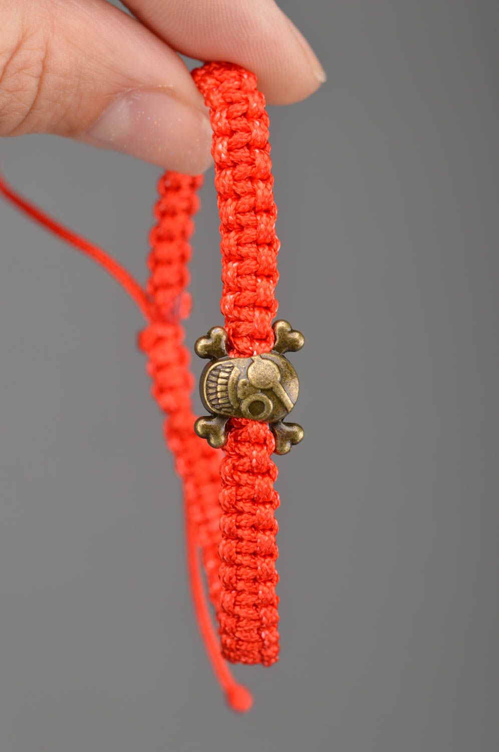 Unusual beautiful handmade designer friendship bracelet woven of red threads  photo 2
