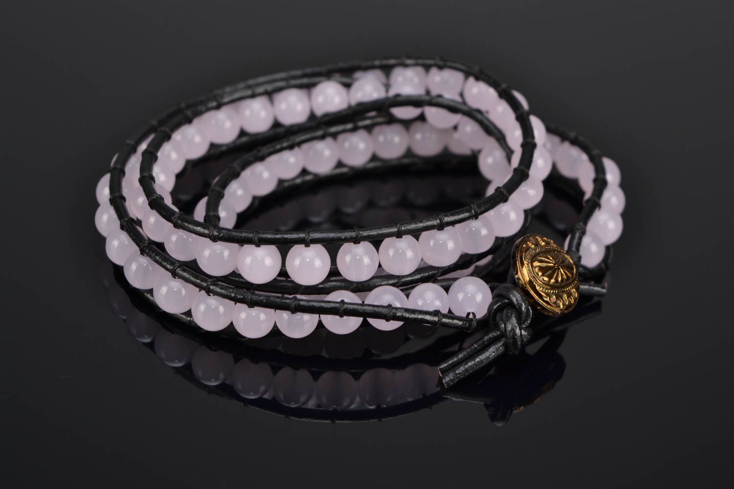 Multi-row woven bracelet with pink quartz photo 1