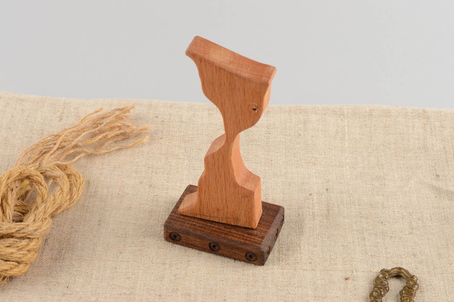 Unusual handmade designer wooden statuette of hourglasses photo 1