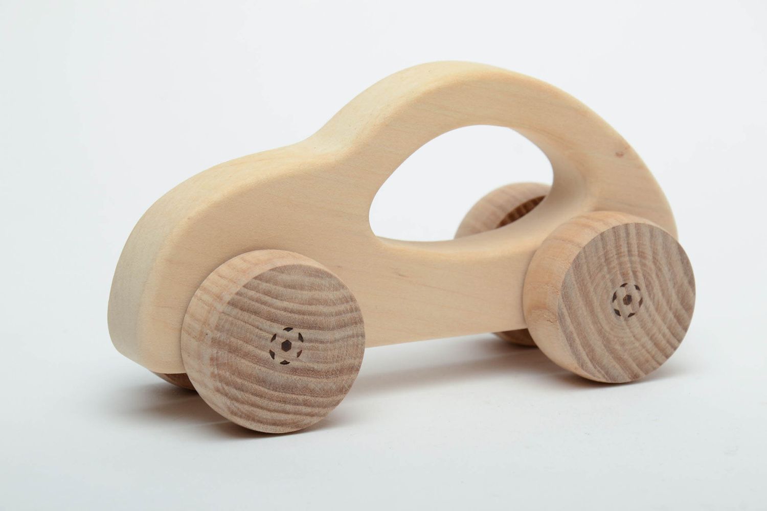 Wooden wheeled toy car photo 2