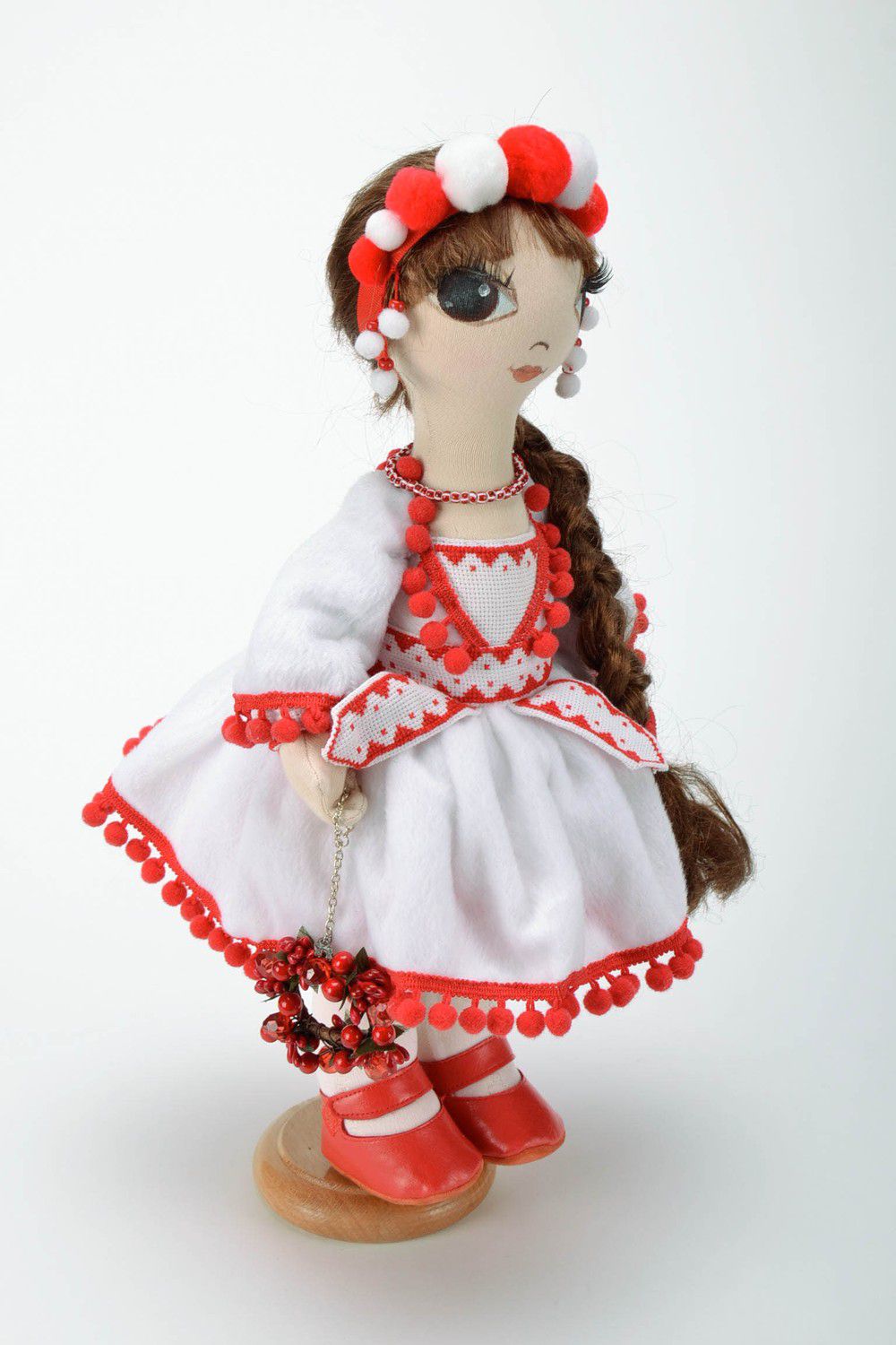 Muñeca con soporte con vestido blanco y rojo foto 1