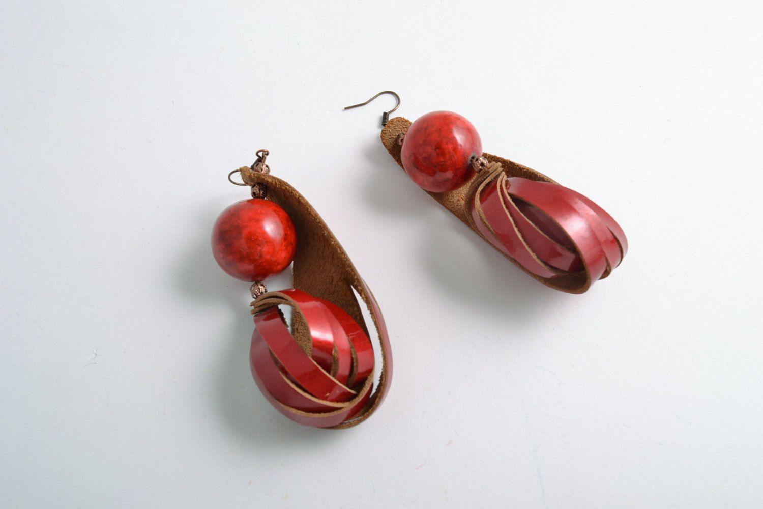 Handmade long earrings made of genuine leather with natural coral stone photo 3