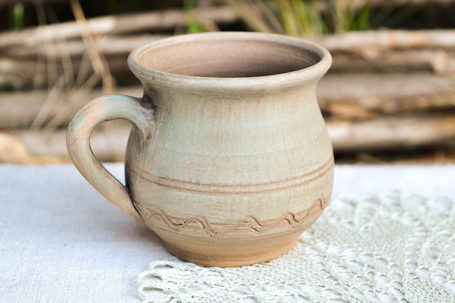 Clay 6 oz drinking cup in olive color and pitcher shape style with handle photo 1