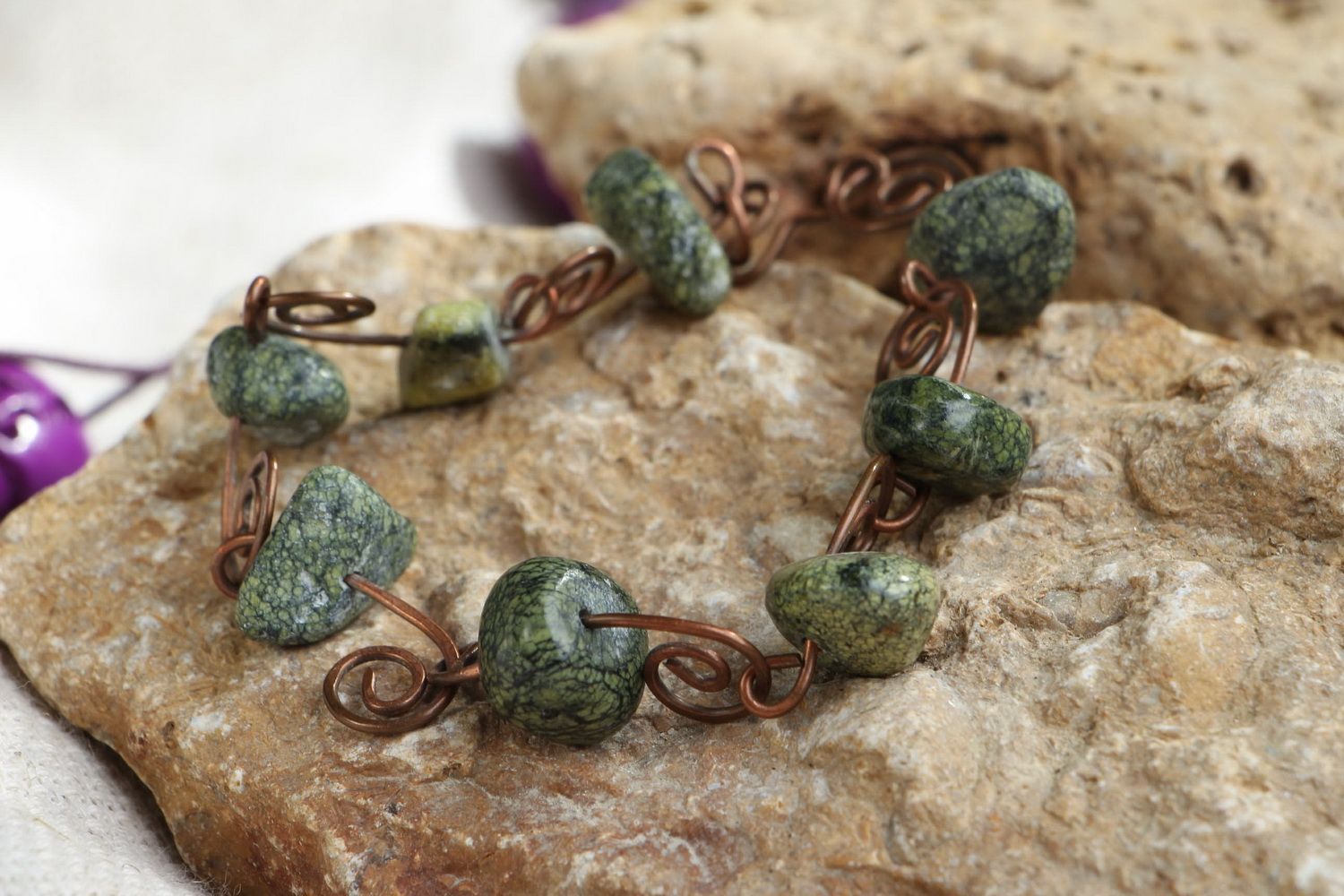 Copper bracelet with a coil stone photo 1