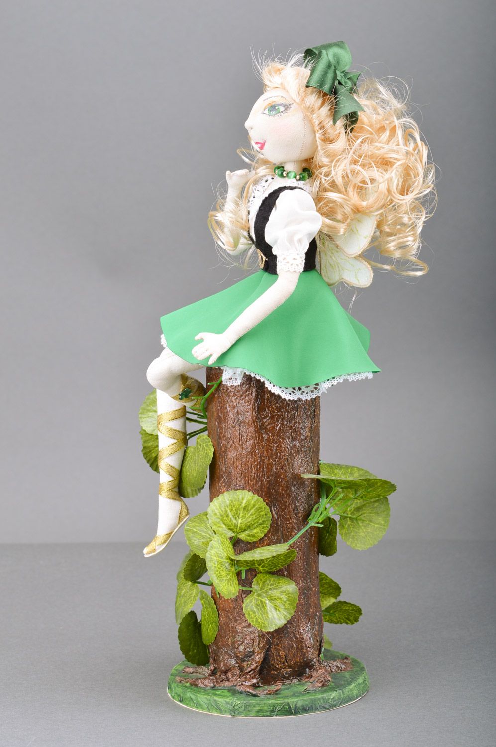 Beautiful handmade designer doll sewn of fabric and lace Elf sitting on stub photo 2