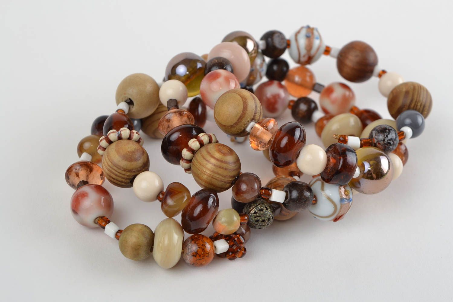 Handmade designer women's wrist bracelet with colorful wooden and glass beads photo 4