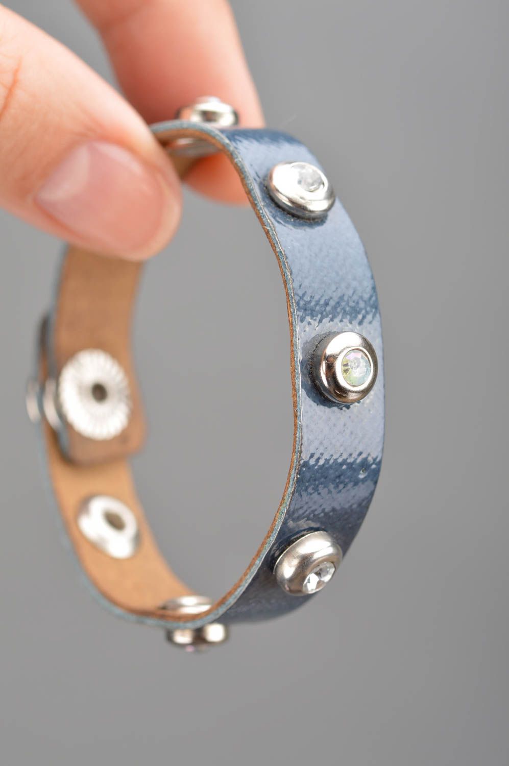 Exclusive handmade delicate leather bracelet with rivets in blue color photo 3