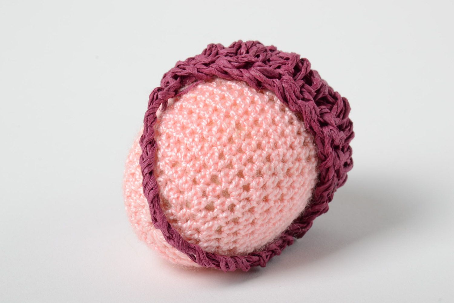 Handmade decorative crochet Easter egg of pink color in basket photo 3
