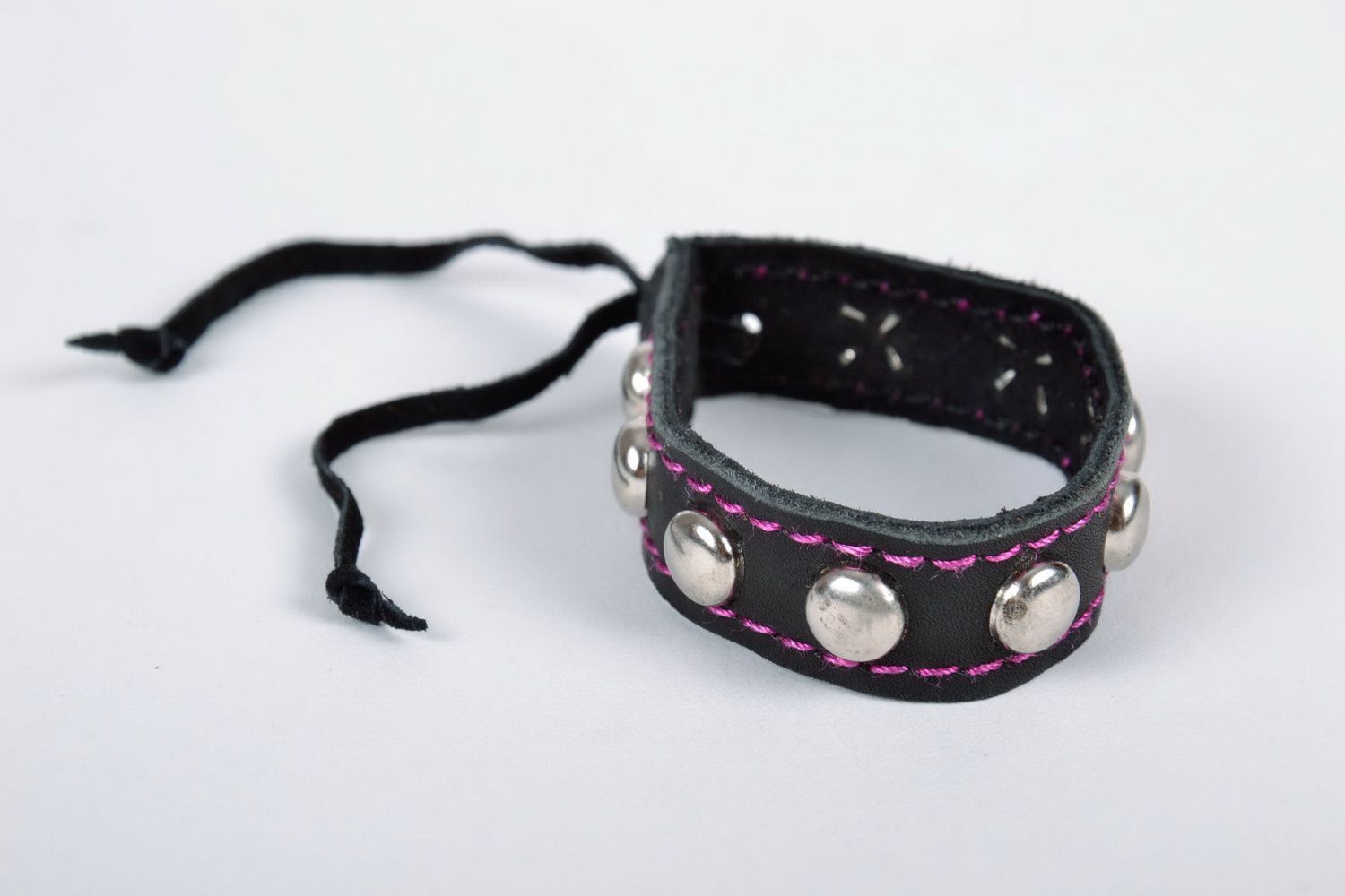 Black leather bracelet with pink line photo 2
