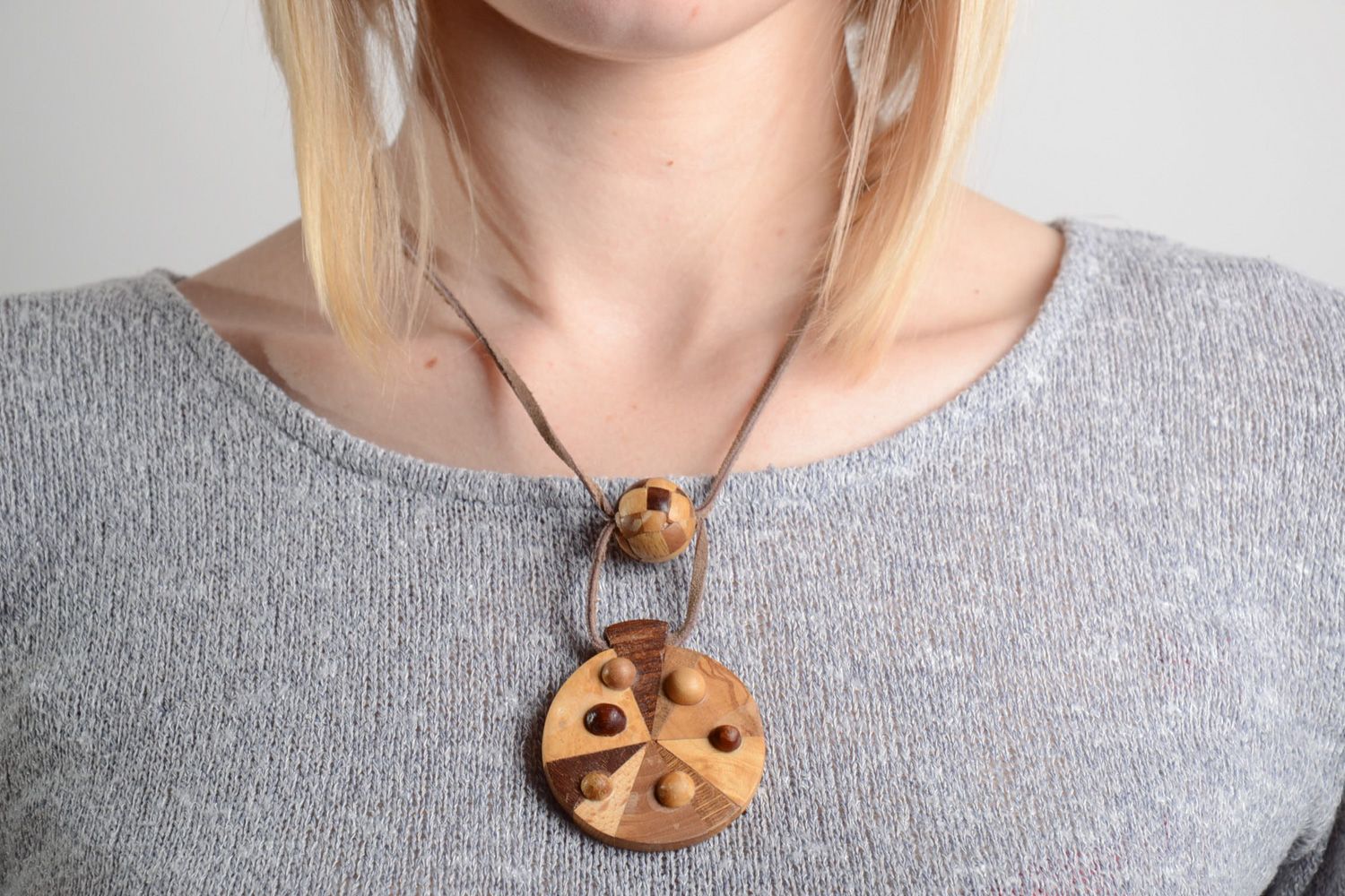 Handmade round neck pendant carved of wood and decorated with intarsia for women photo 2