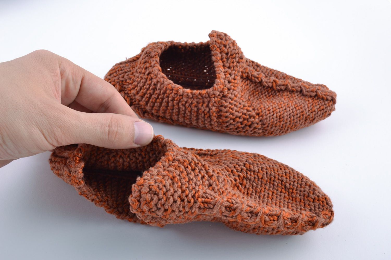 Beautiful warm handmade knitted half-woolen slippers of brown color photo 5