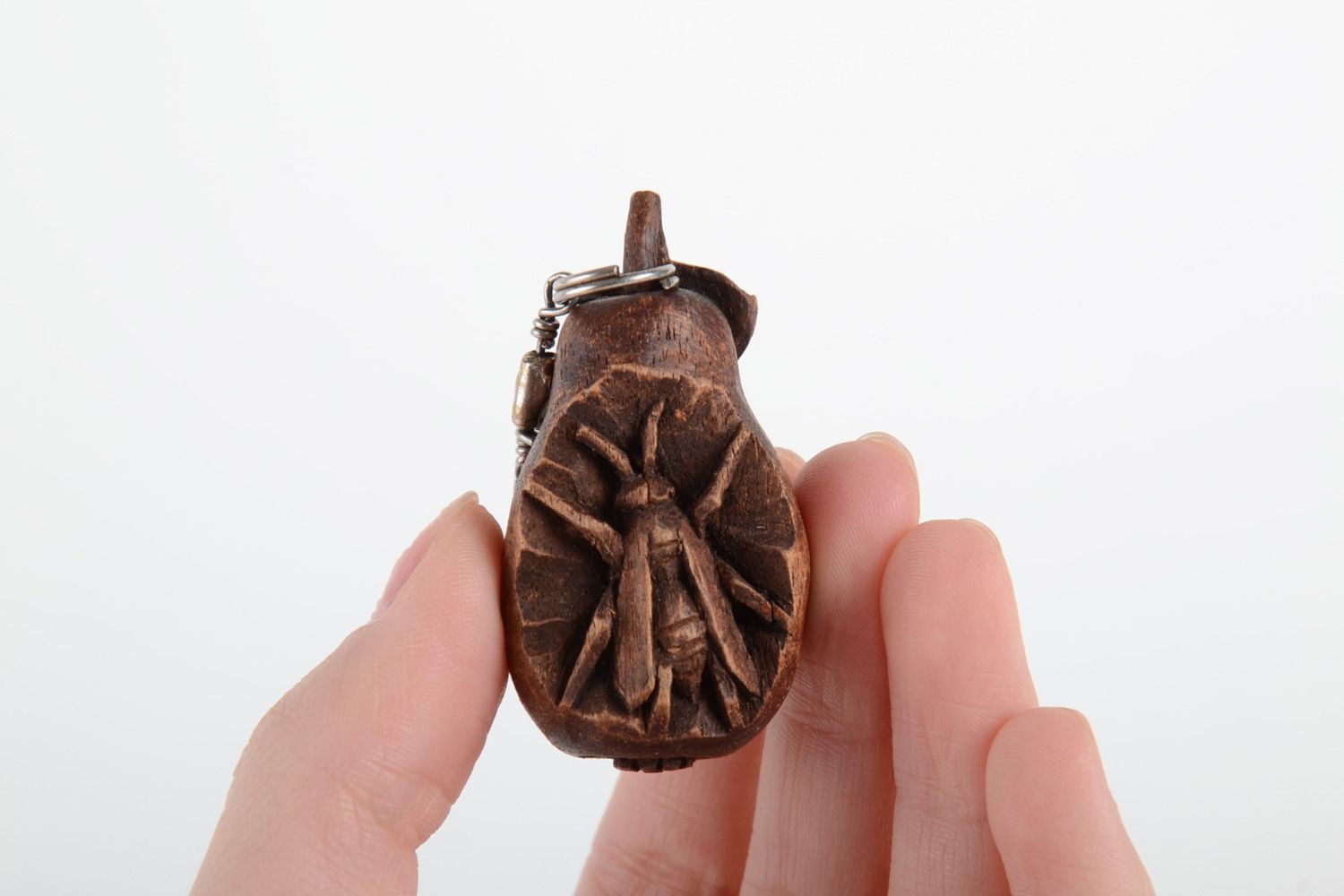 Small handmade decorative keychain carved of natural wood tinted and varnished  photo 5