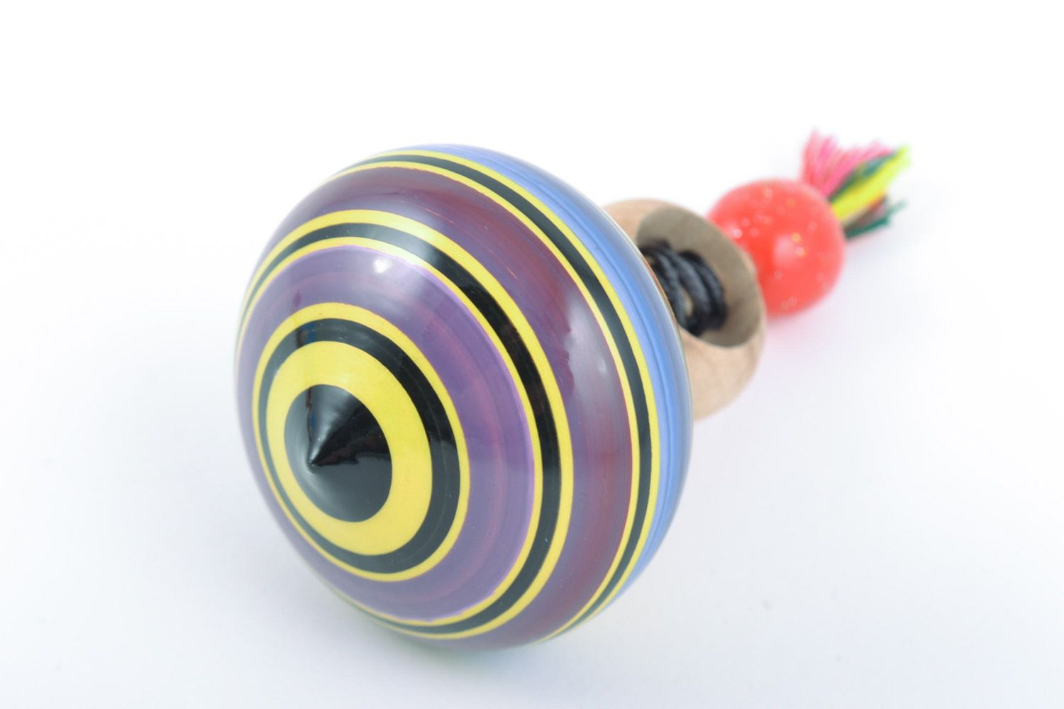 Handmade decorative spinning top with a ring for the development of fine motor skills of the baby photo 3