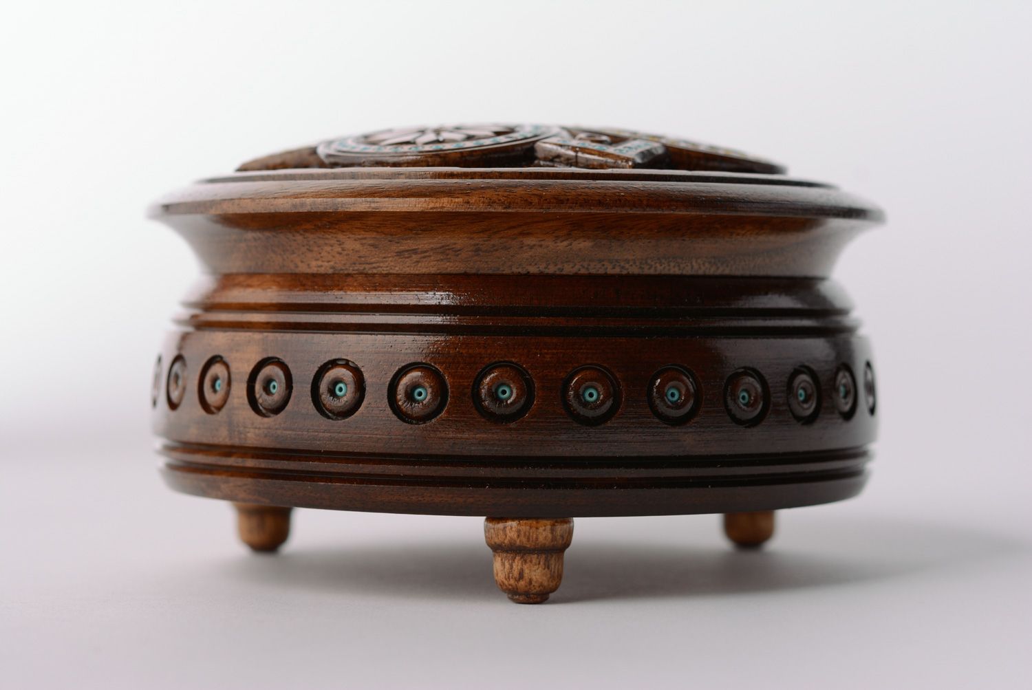 Dark wooden handmade jewelry box of round shape with art carving and bead inlay photo 2