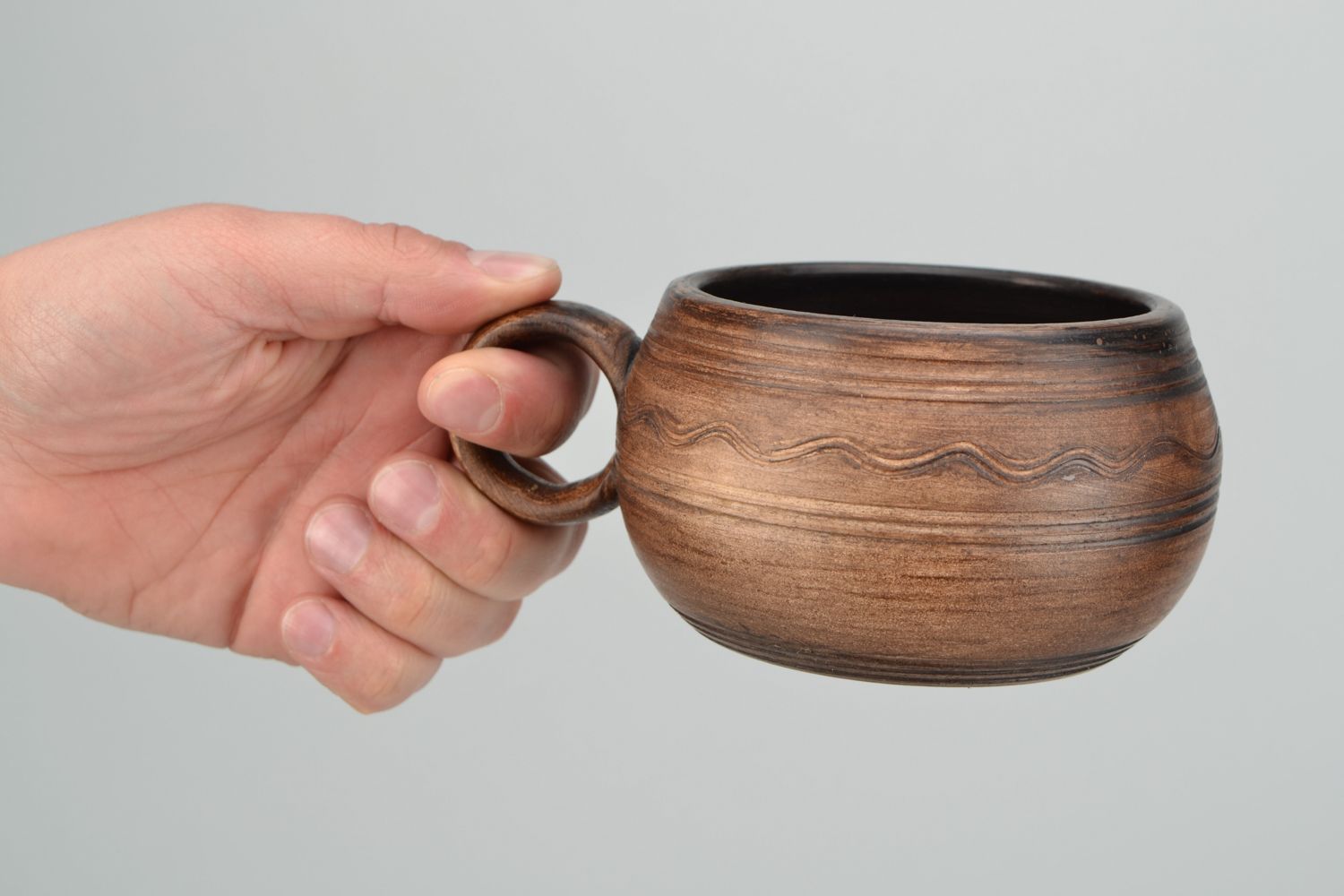 Medium size  5 oz clay cup in pot shape with handle in brown color photo 2