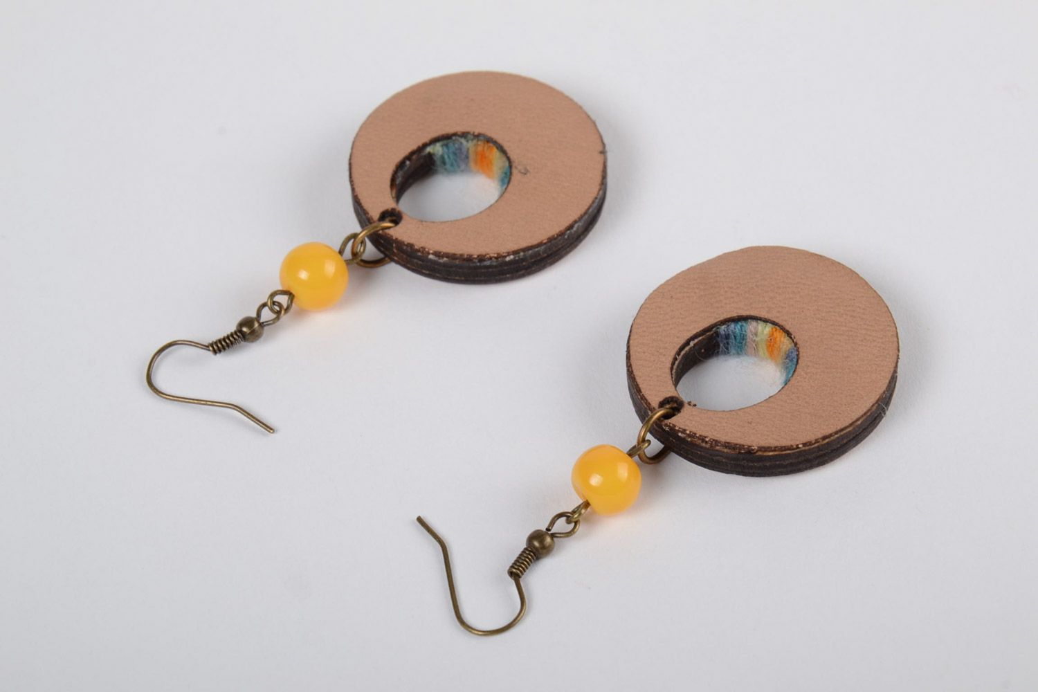 Handmade round plywood earrings with yellow and blue embroidery and beads photo 3