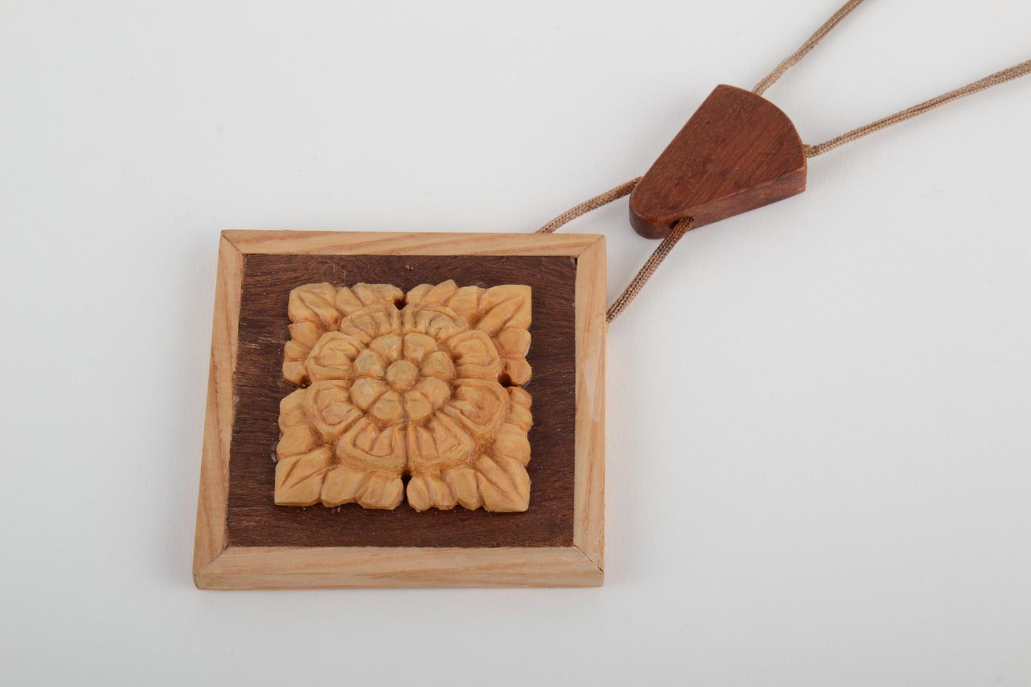 Handmade carved wooden neck pendant with intarsia equipped with cord for women photo 3