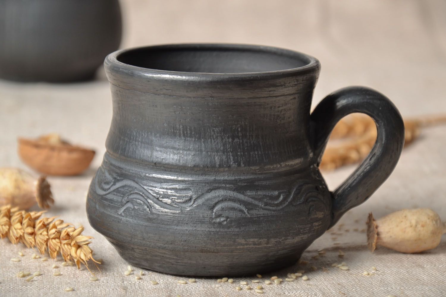 Black color natural clay coffee nug in ancient style shape with handle and no pattern photo 1