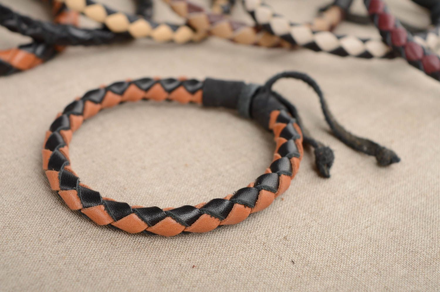 Thin woven leather bracelet with adjustable size photo 1