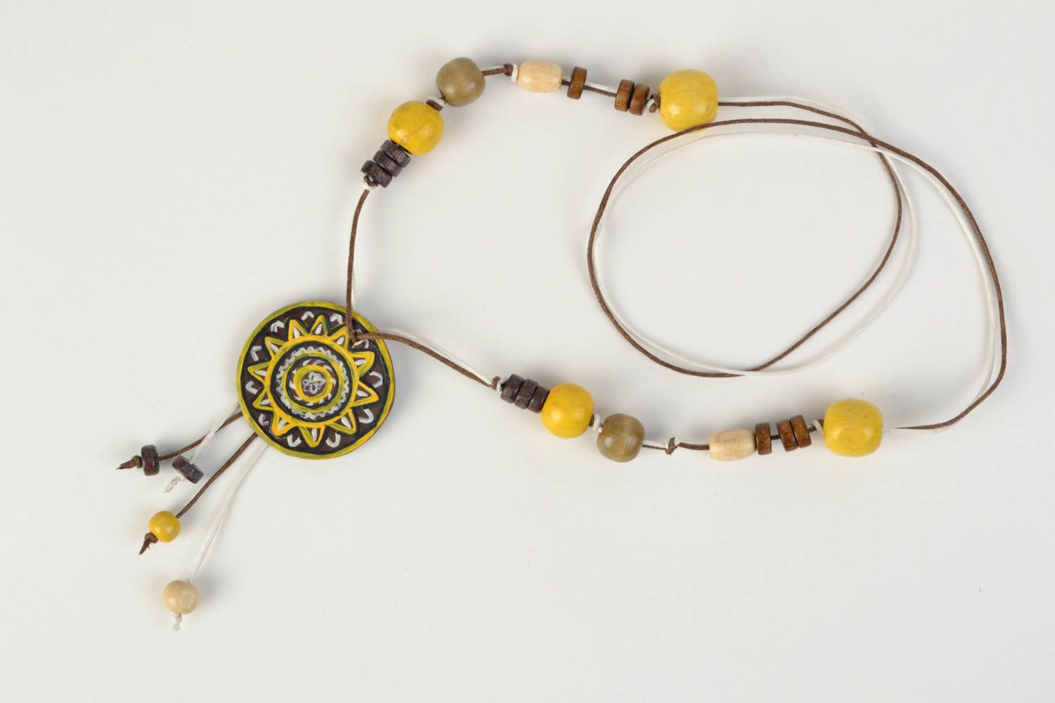 Handmade ethnic yellow and black polymer clay neck pendant on a cord with beads  photo 3