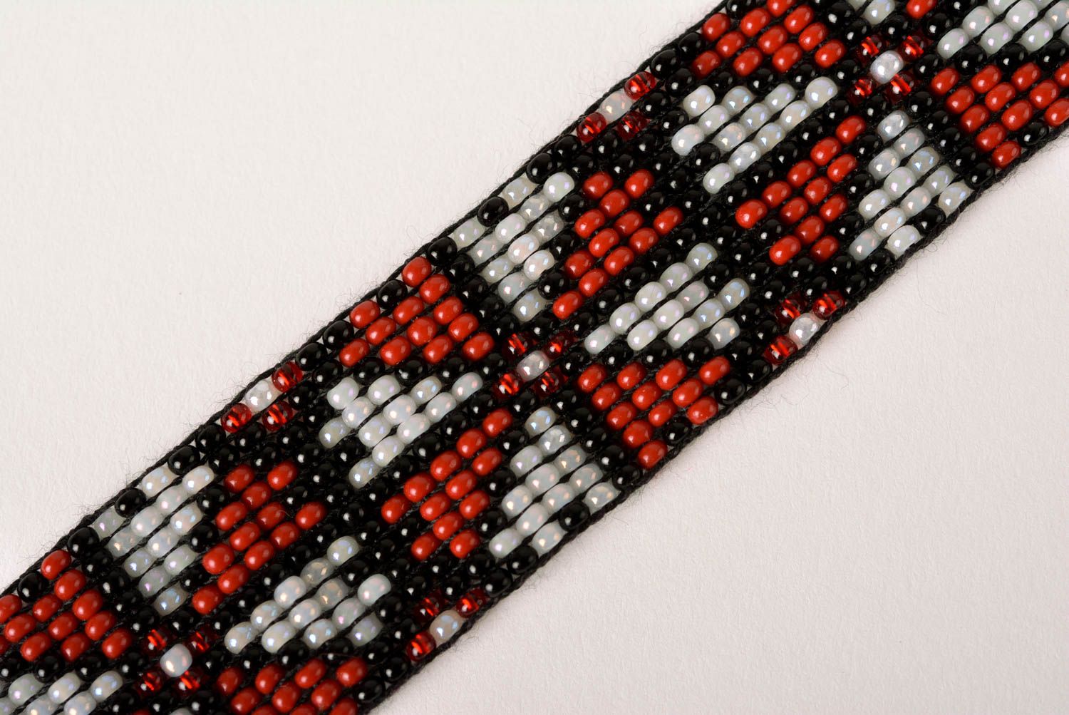Black cord strand bracelet with geometric ornament for girls photo 5