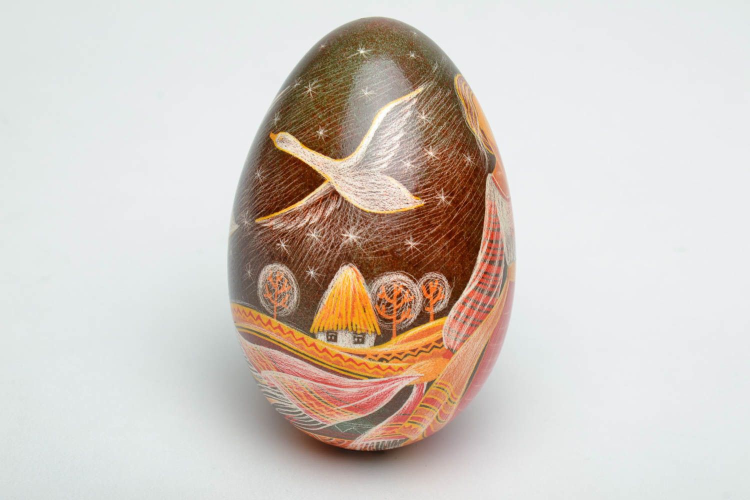 Painted Easter egg decorated using scratching technique photo 3
