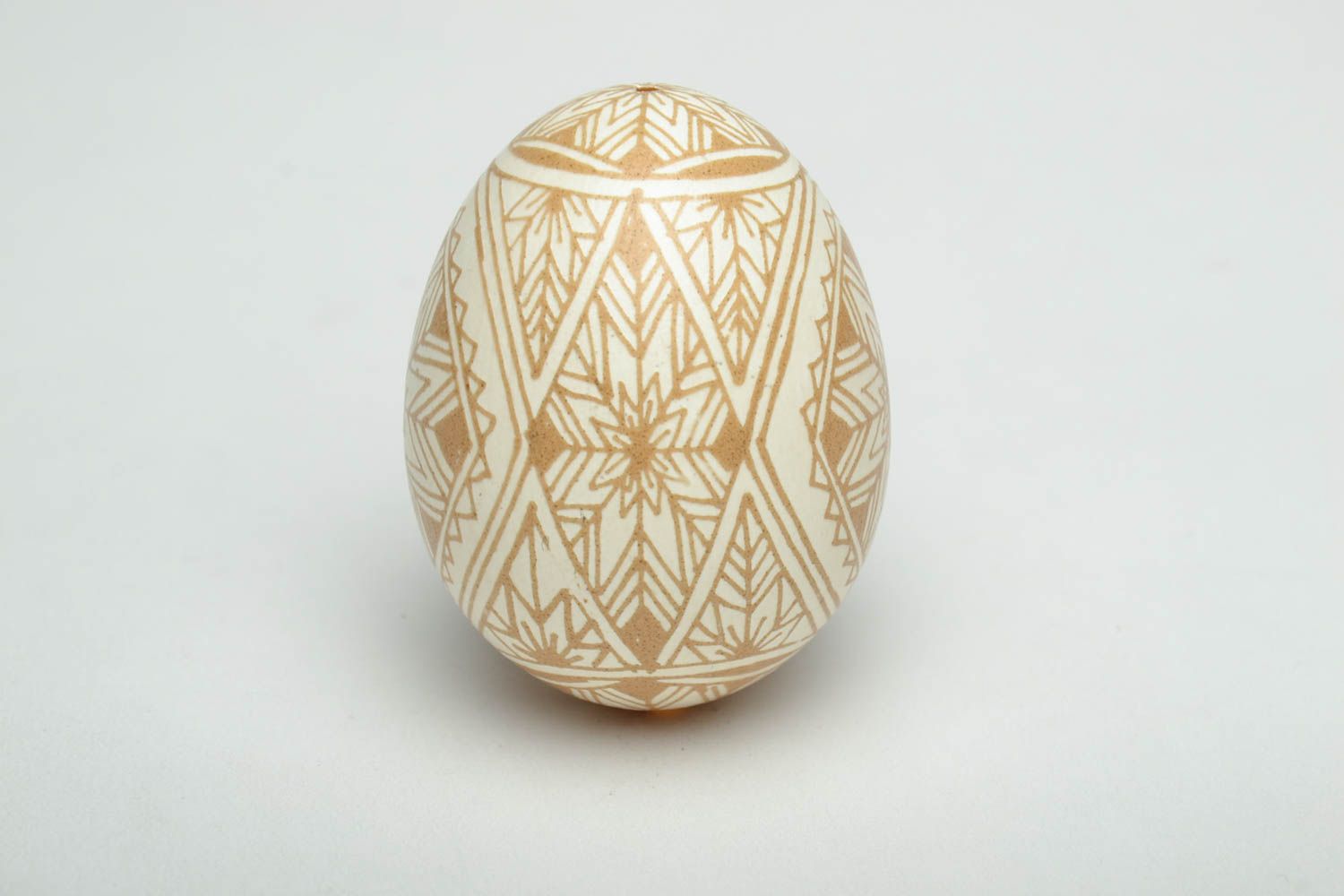 Easter egg with traditional symbolics made using etching technique photo 3