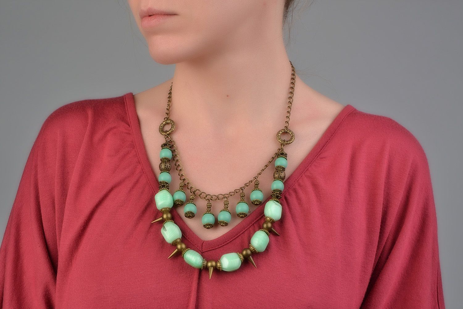 Handmade multi row necklace with glass beads of mint color and metal prickles  photo 1